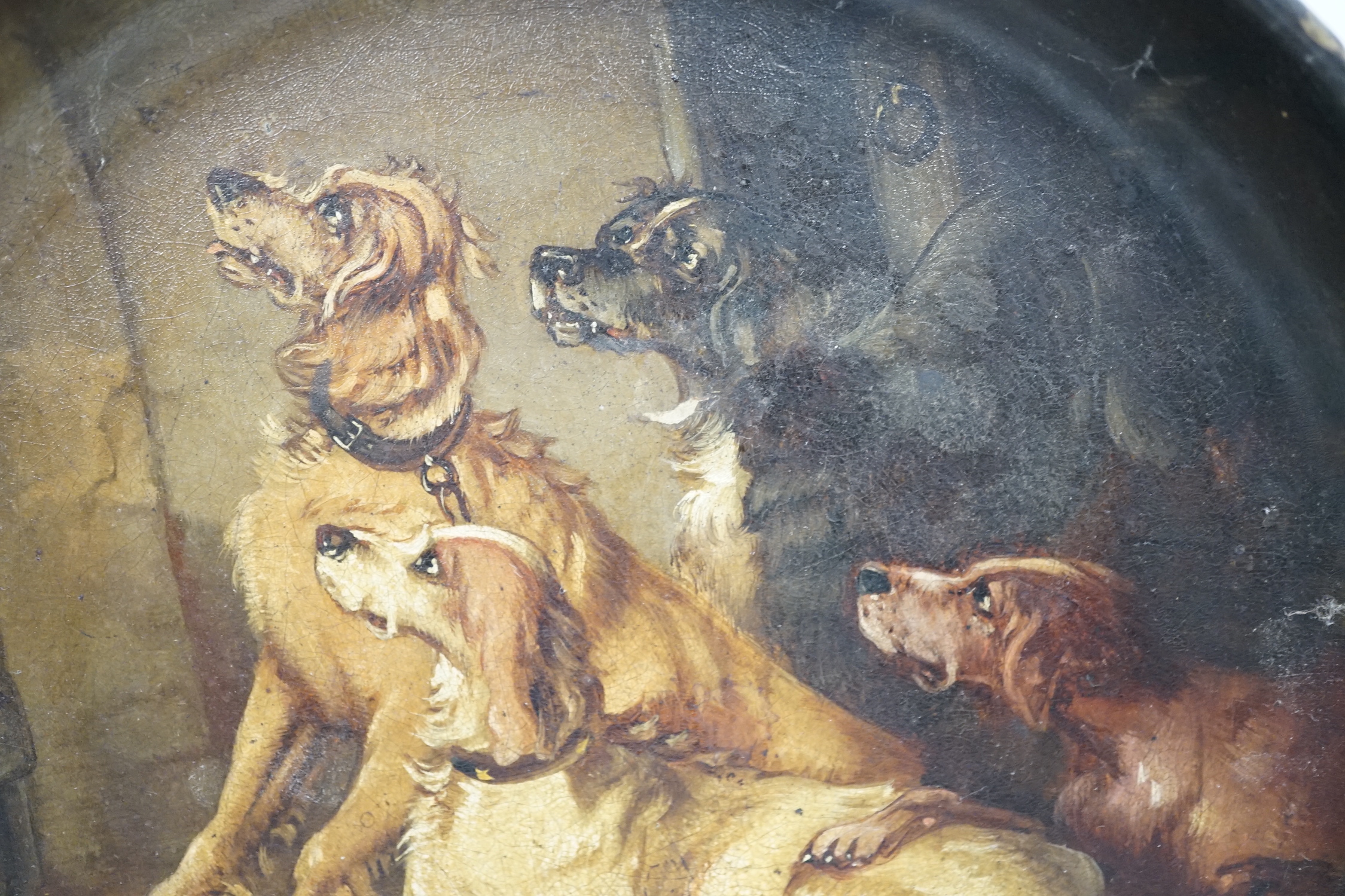 A late 19th century painted papier mache dish, Ready for the Sport, decorated with seated spaniels, 21cm